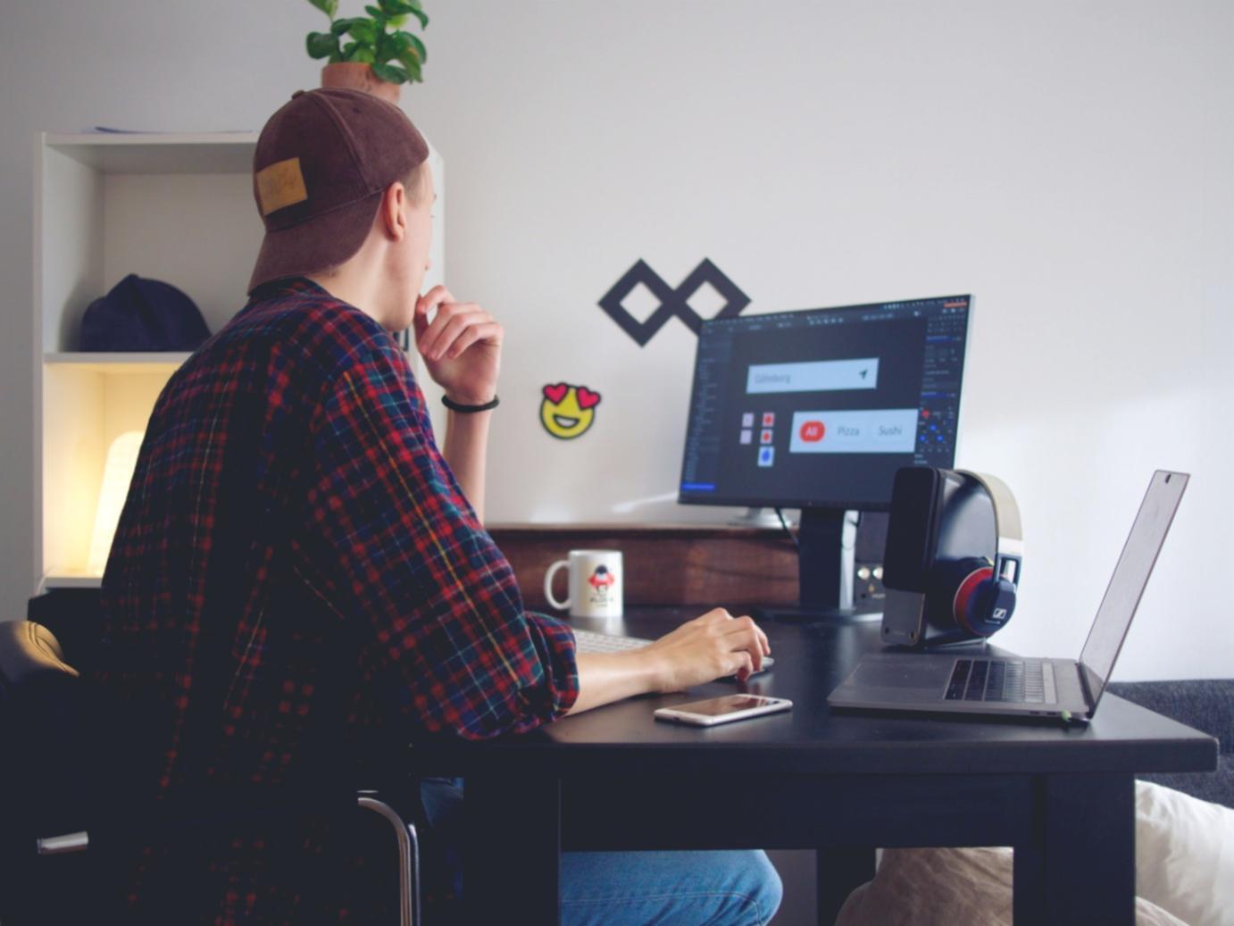 Student working on iOS game development project
